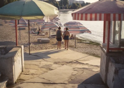 Russian tourists seen from behind in a beach